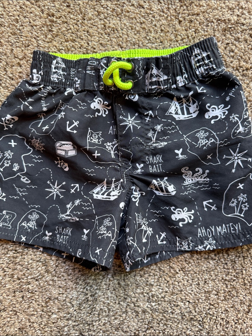 OshKosh B'gosh | Black Pirate Map Swim Shorts with Neon Drawstring
